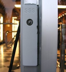 Medium grey steel SV25 blockers attached to steel door